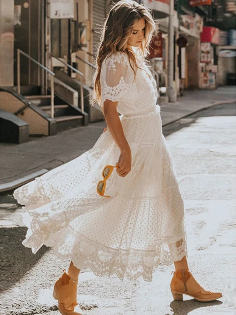 Boho chic dresses 2026 featuring flowy silhouettes, earthy tones, linen fabrics, and modern bohemian fashion for women.